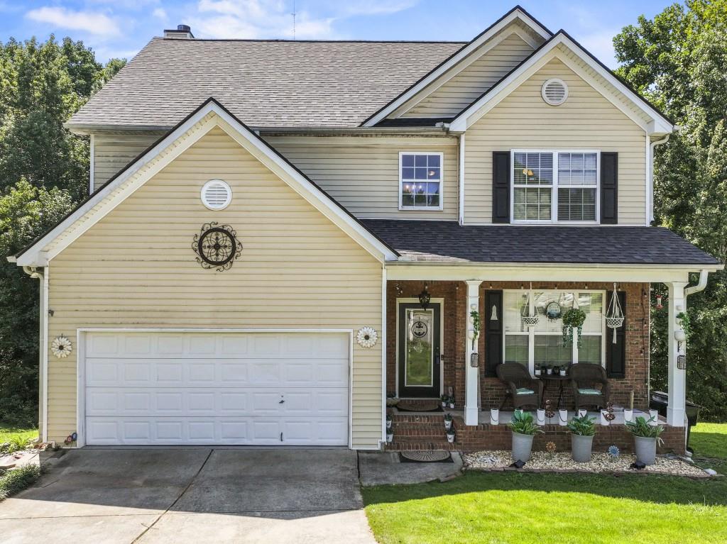 95 Ridge Water Lane Dawsonville, GA 30534 - Photo 1 of 45 a front view of house with yard