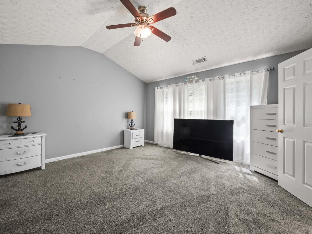 95 Ridge Water Lane Dawsonville, GA 30534 - Photo 17 of 45 a view of an empty room with cabinet and a window