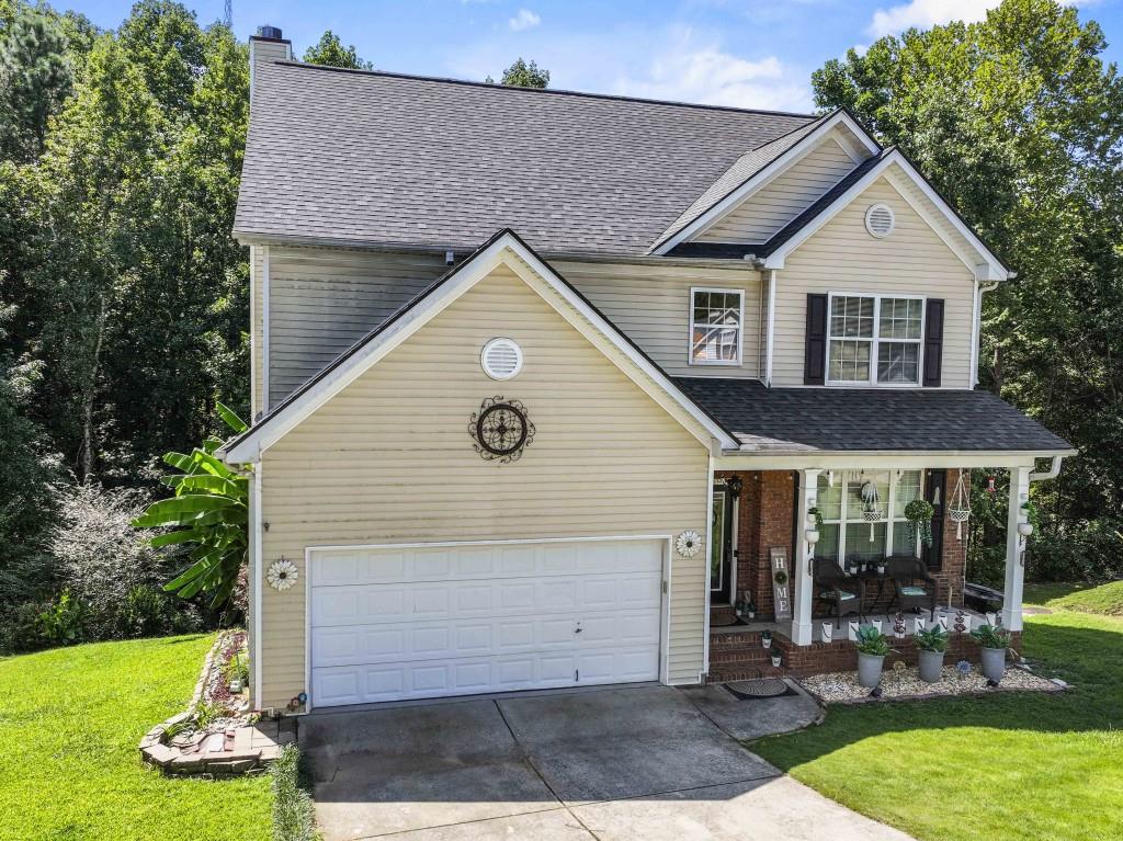 95 Ridge Water Lane Dawsonville, GA 30534 - Photo 2 of 45 a view of a yard in front of house