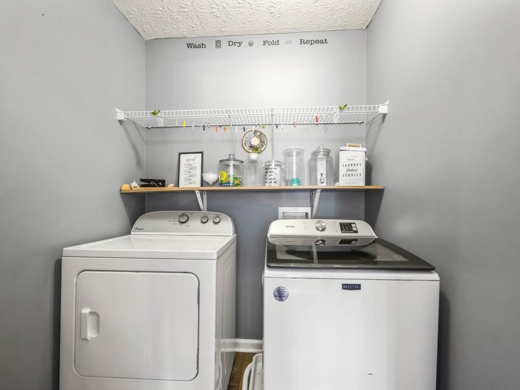 95 Ridge Water Lane Dawsonville, GA 30534 - Photo 23 of 45 a utility room with dryer and washer