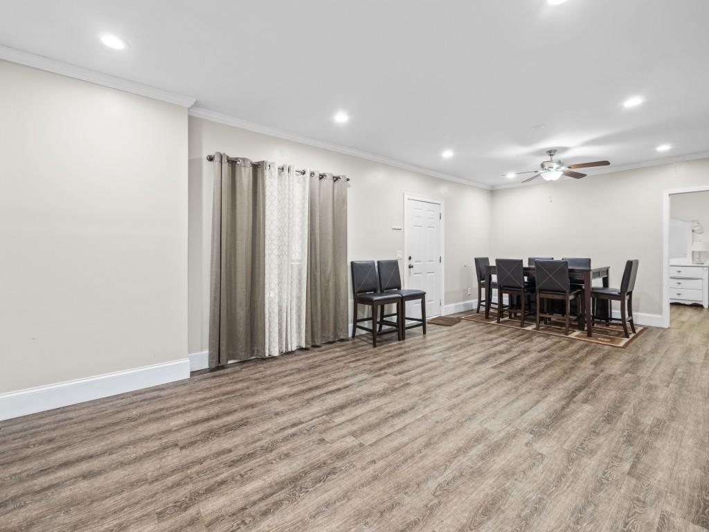 95 Ridge Water Lane Dawsonville, GA 30534 - Photo 34 of 45 a view of a room with furniture and wooden floor