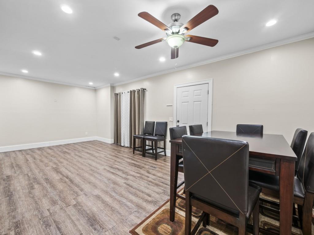 95 Ridge Water Lane Dawsonville, GA 30534 - Photo 35 of 45 a workspace with furniture a ceiling fan and wooden floor