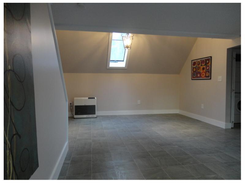 107 Town Farm Road Pittston, ME 04345 - Photo 5 of 35 Living Room. with skylight and...