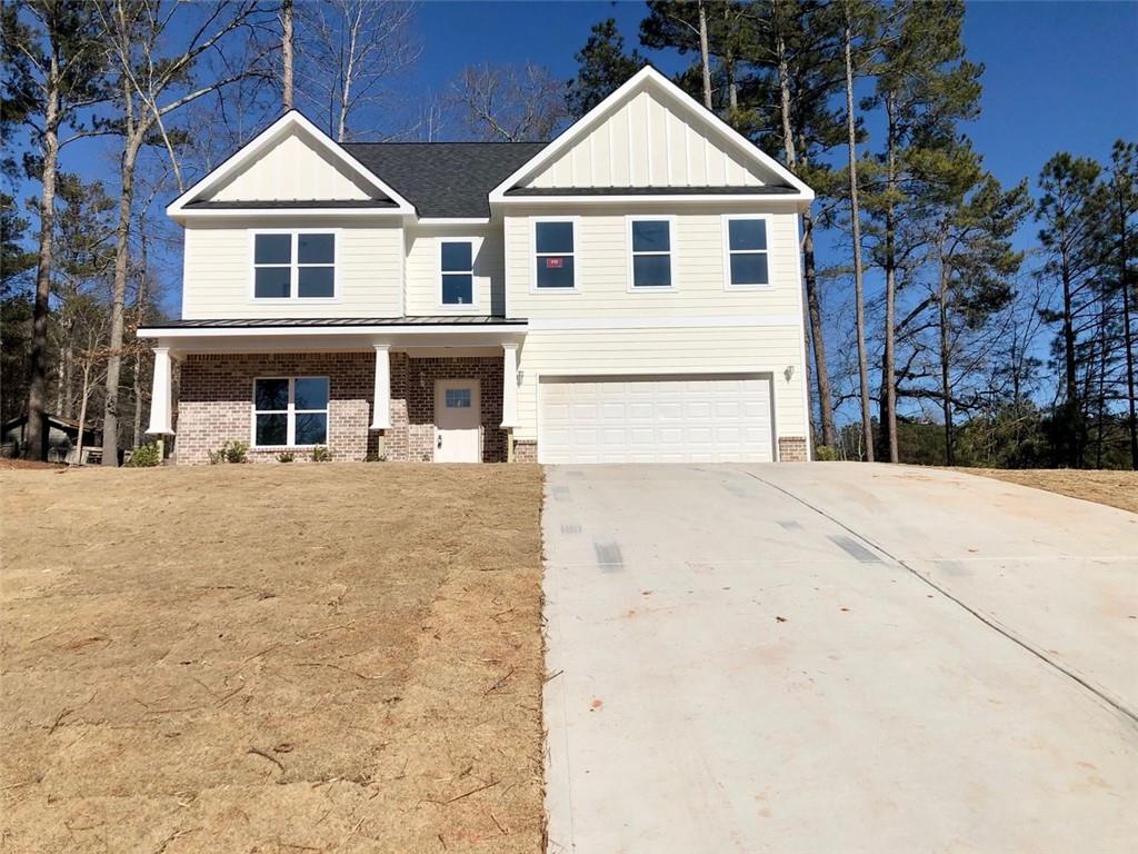 195 Ridgecrest Way Stockbridge, GA 30281 - Photo 1 of 1 a front view of a house with a yard
