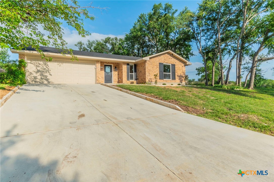 4013 Valley View Drive Temple, TX 76502 - Photo 22 of 25 a dirt road with a house in the background