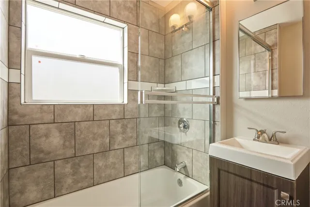 a bathroom with a sink and a bathtub