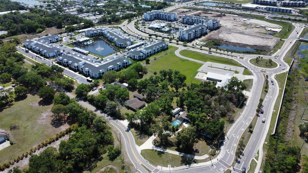 6440 Richardson Road Sarasota, FL 34240 - Photo 13 of 15 an aerial view of a house with a garden and swimming pool