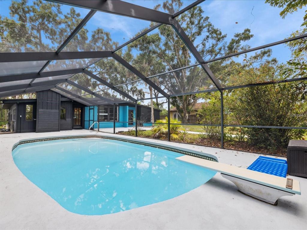 6440 Richardson Road Sarasota, FL 34240 - Photo 4 of 15 a view of swimming pool with seating area
