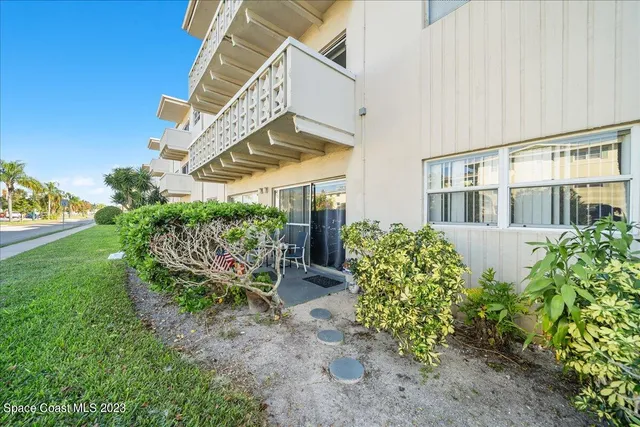 a view of a swimming pool with a terrace