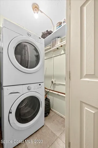 a view of a pool with a patio