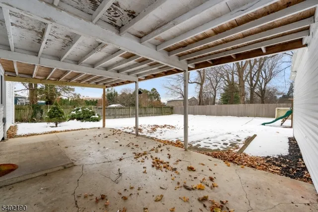 a view of a backyard of the house