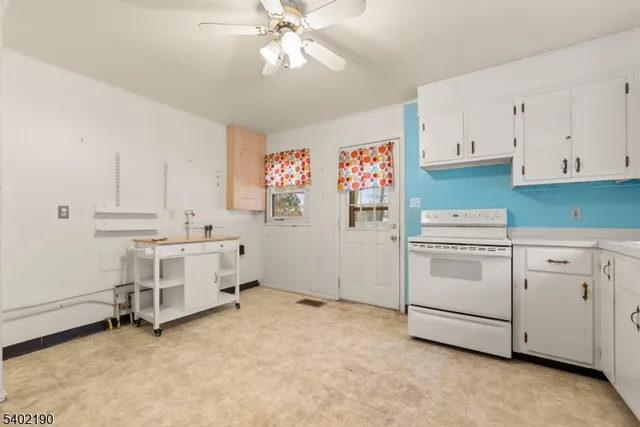 a view of cabinets and window