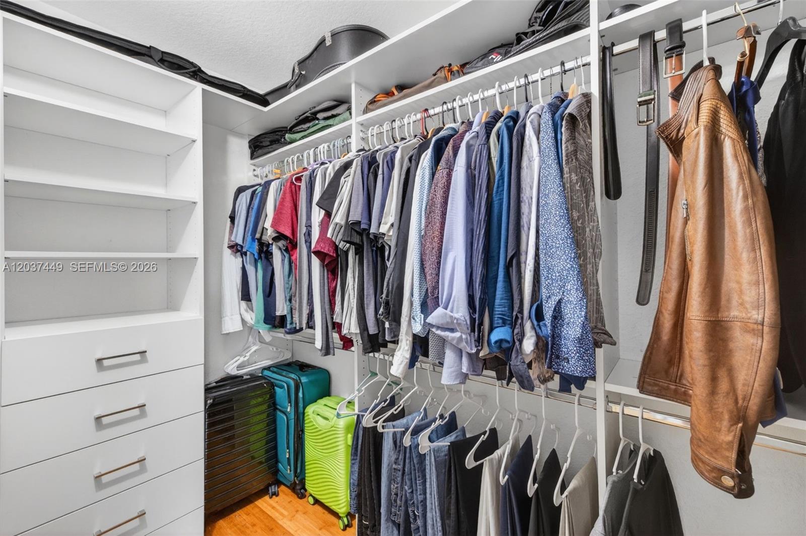 17488 Southwest 28th Court Miramar, FL 33029 - Photo 28 of 50 a view of walk in closet with clothes