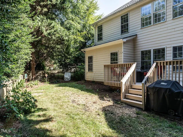 a view of a chairs on the roof deck