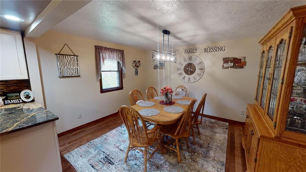 171 Woodcrest Road Butler, PA 16002 - Photo 7 of 25 a dining room with furniture and window