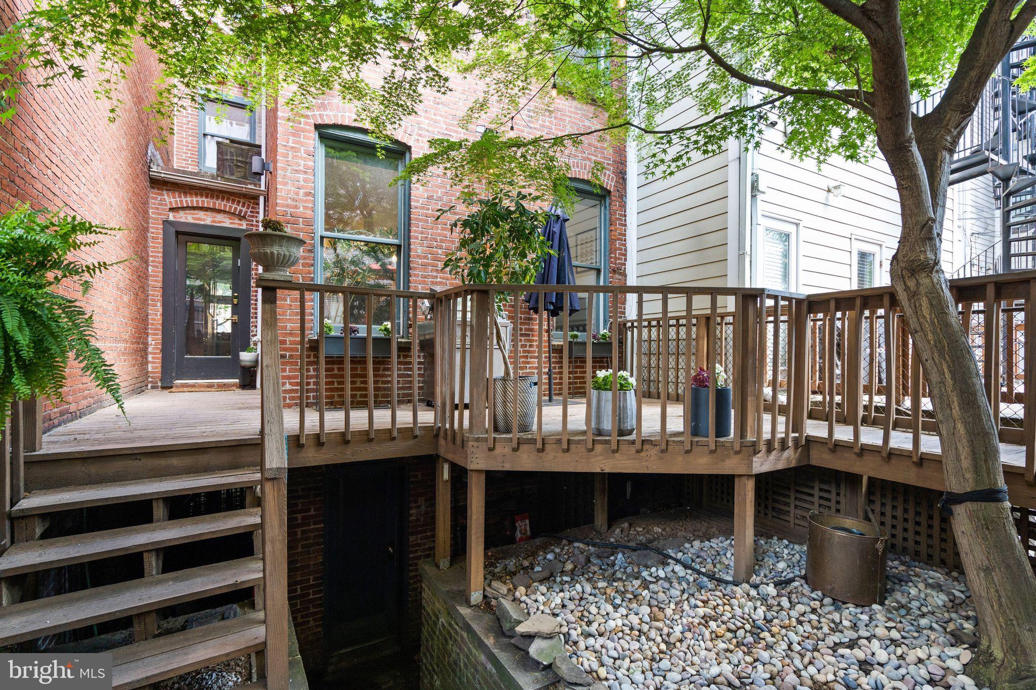 2026 15th Street Northwest Washington, DC 20009 - Photo 43 of 47 a view of a house with a deck