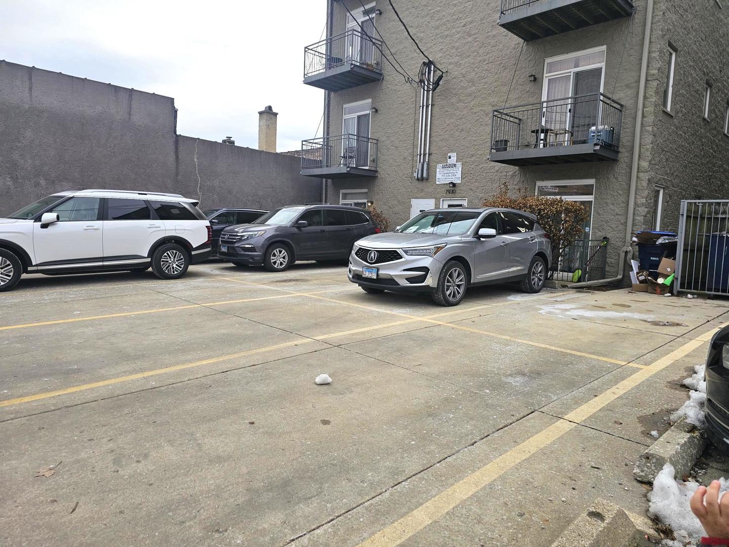 7932 West Grand Avenue, Unit 2W Elmwood Park, IL 60707 - Photo 22 of 22 a view of street with parked cars