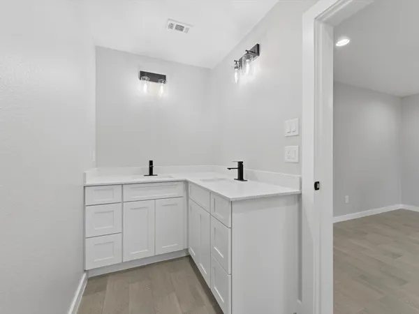 a bathroom with a toilet and a bathtub