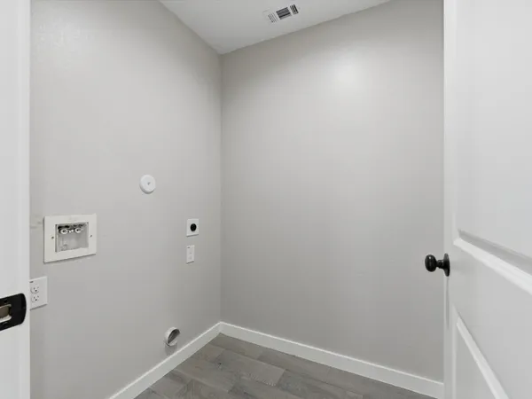 a bathroom with a bathtub and a toilet