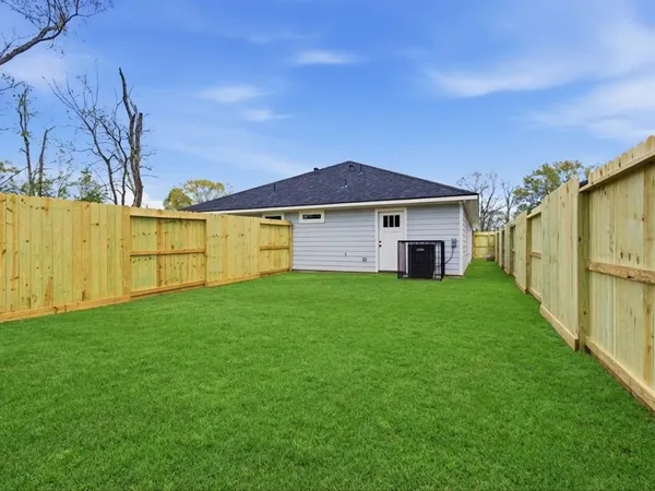 a view of backyard with trees