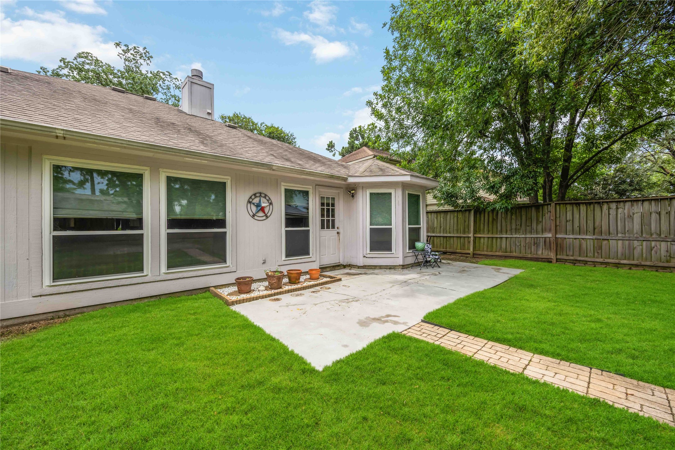 3226 Keygate Drive Spring, TX 77388 - Photo 25 of 34 Backyard with Walkway to Paved Area
