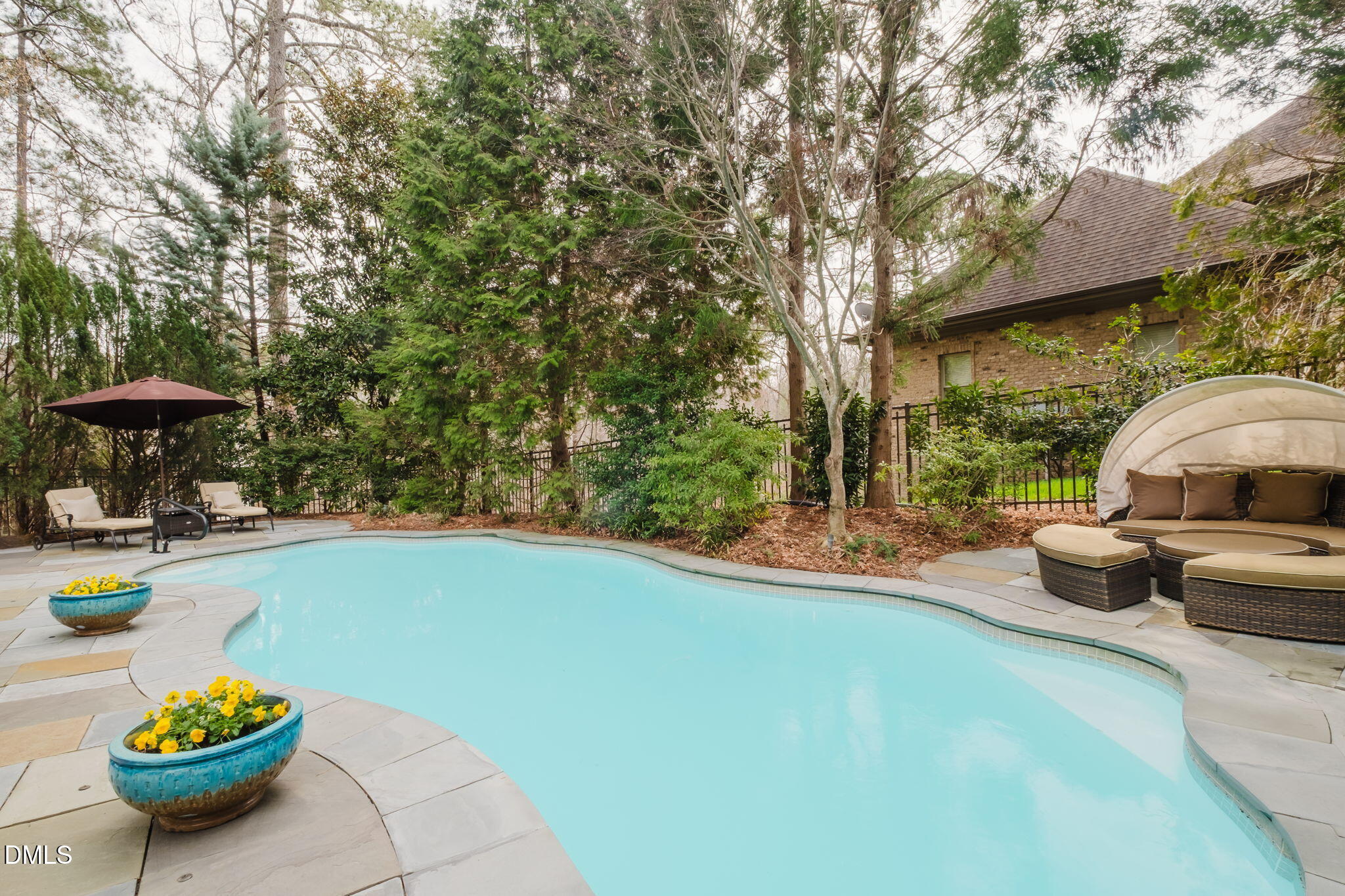 3604 Nightfall Court Raleigh, NC 27607 - Photo 6 of 79 a view of a swimming pool with a patio
