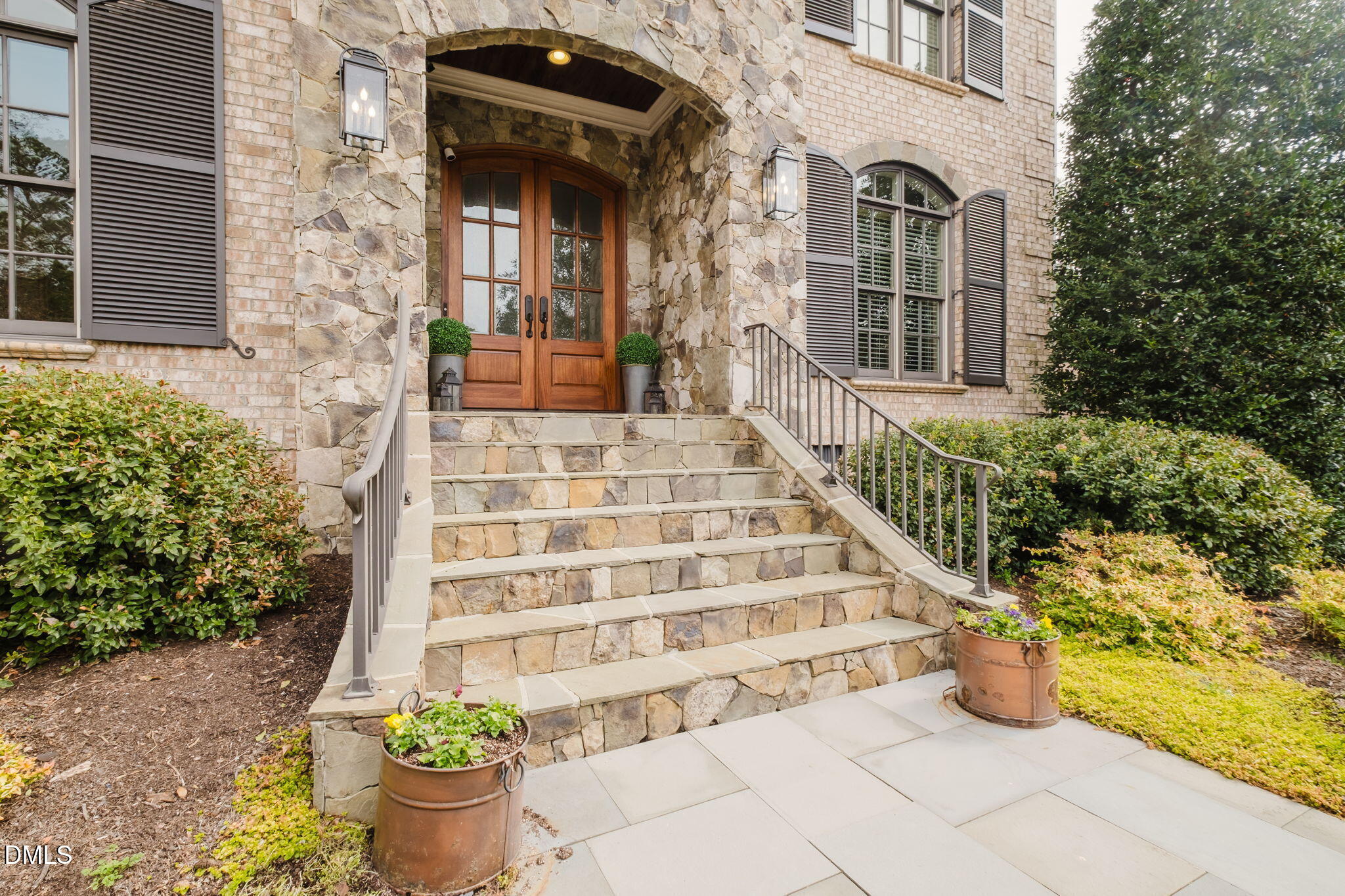 3604 Nightfall Court Raleigh, NC 27607 - Photo 10 of 79 a front view of a house with potted plants