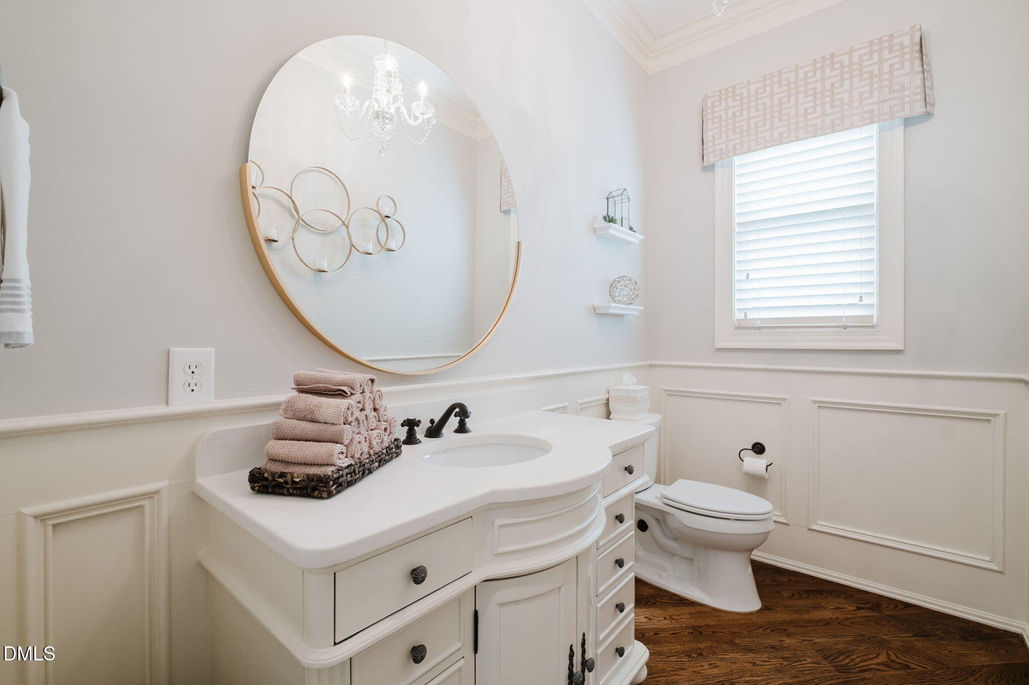 3604 Nightfall Court Raleigh, NC 27607 - Photo 33 of 79 a bathroom with a sink and a mirror