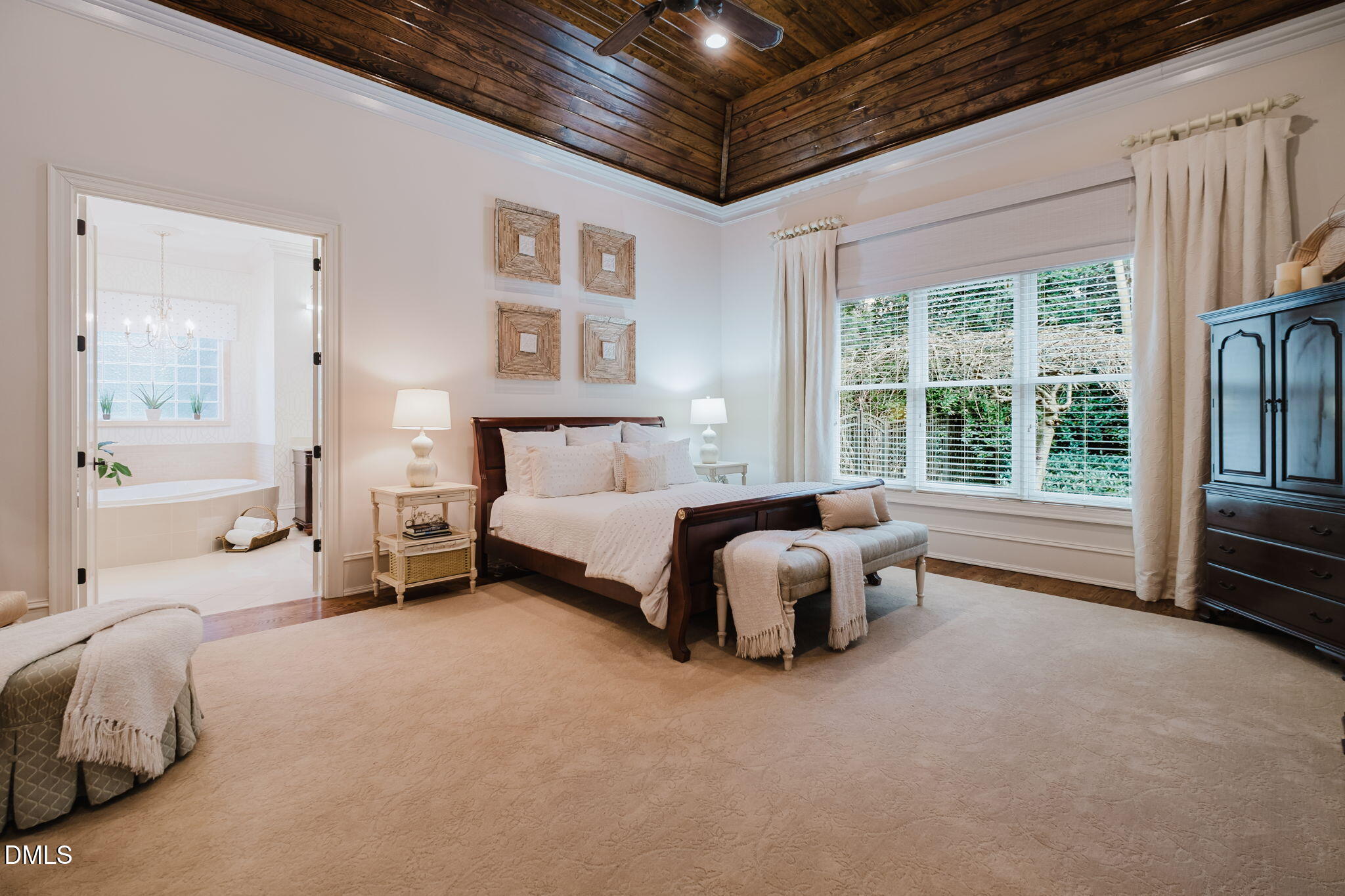 3604 Nightfall Court Raleigh, NC 27607 - Photo 34 of 79 a bedroom with a bed and a large window