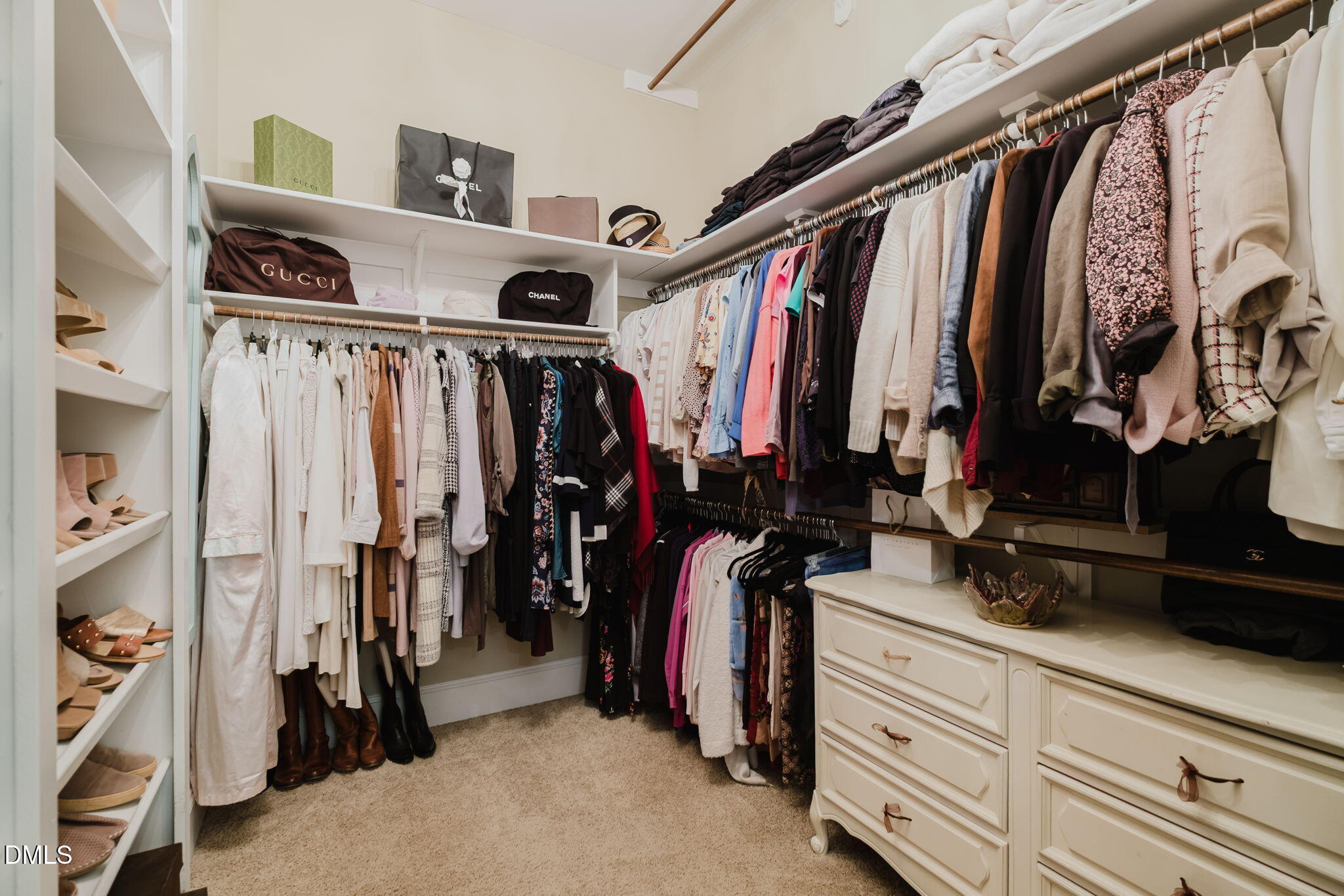 3604 Nightfall Court Raleigh, NC 27607 - Photo 39 of 79 a view of walk in closet with clothes and shoes