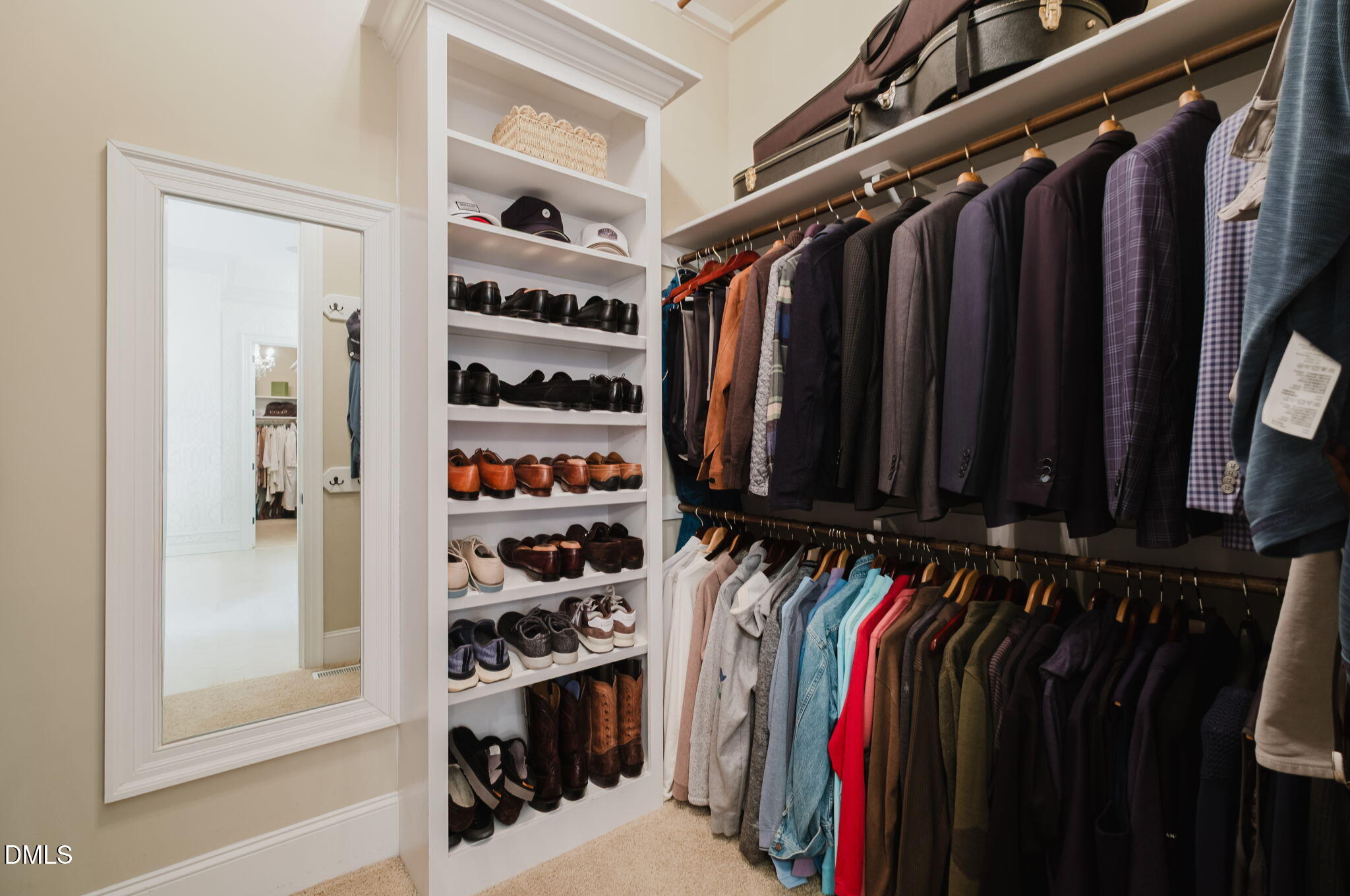 3604 Nightfall Court Raleigh, NC 27607 - Photo 40 of 79 a view of walk in closet with clothes and shoes