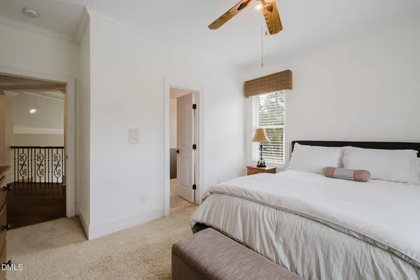 a living room with furniture a rug and a flat screen tv