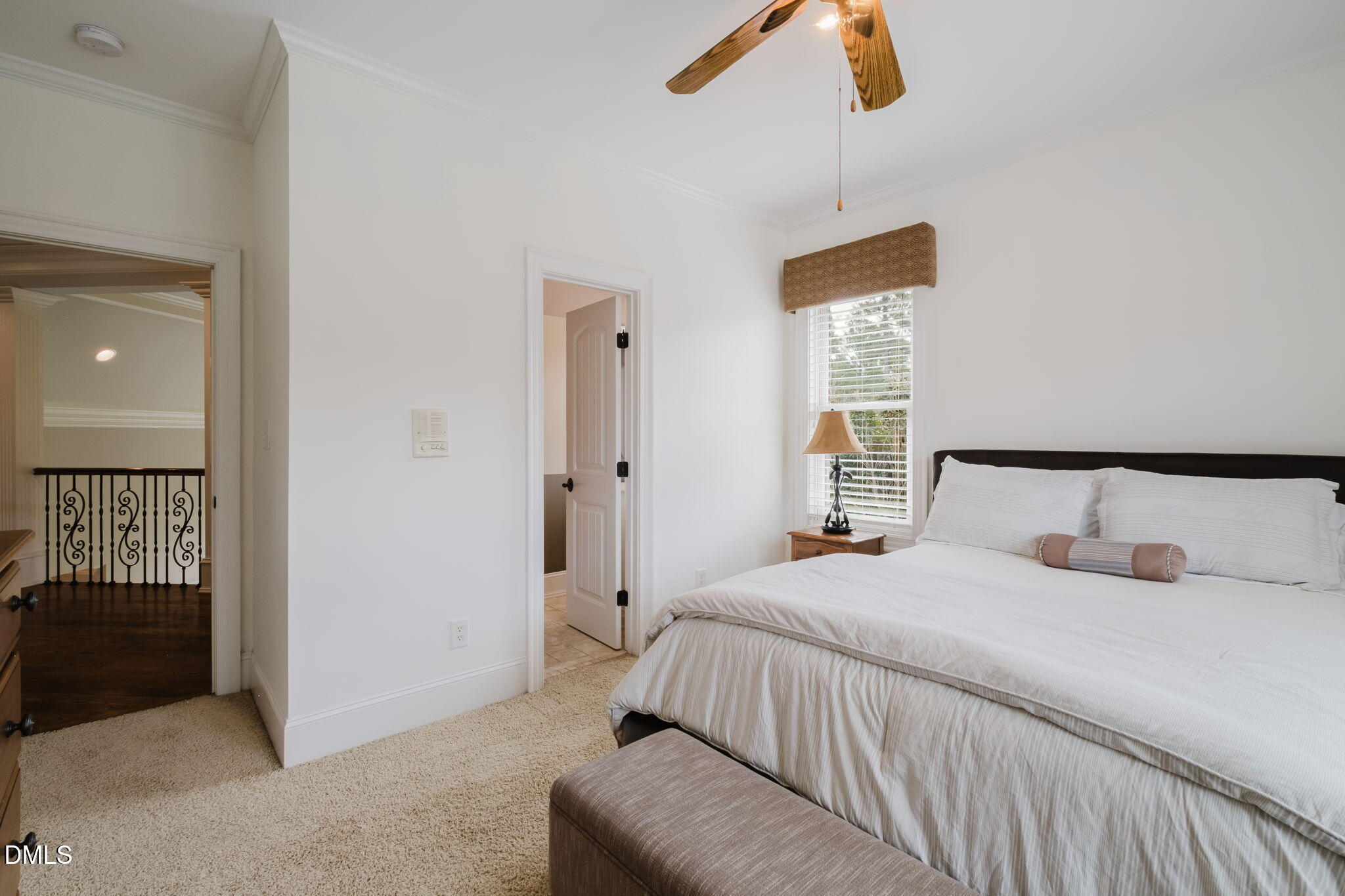 3604 Nightfall Court Raleigh, NC 27607 - Photo 43 of 79 a bedroom with a bed and a lamp