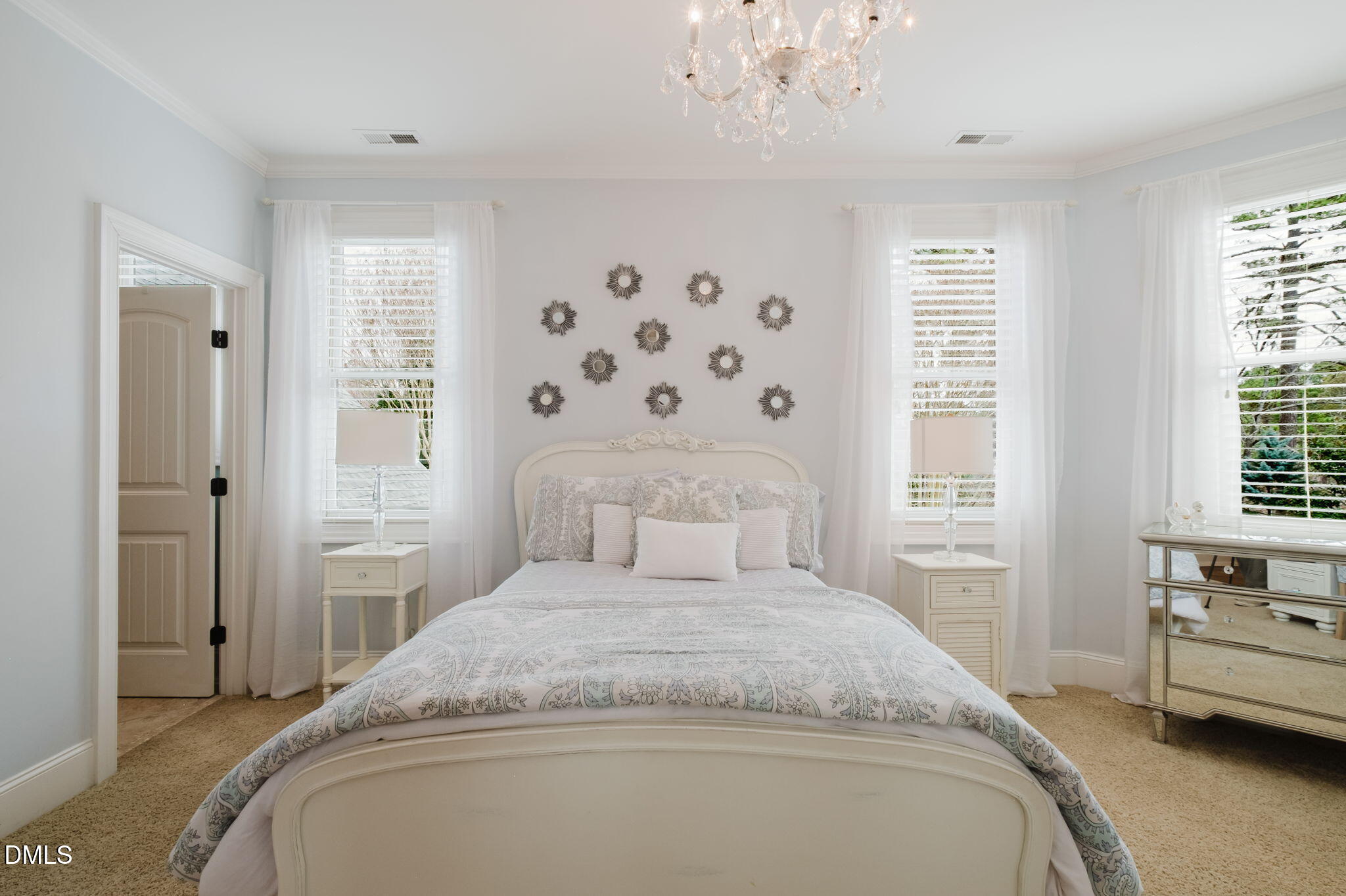 3604 Nightfall Court Raleigh, NC 27607 - Photo 45 of 79 a bedroom with a large bed and a window