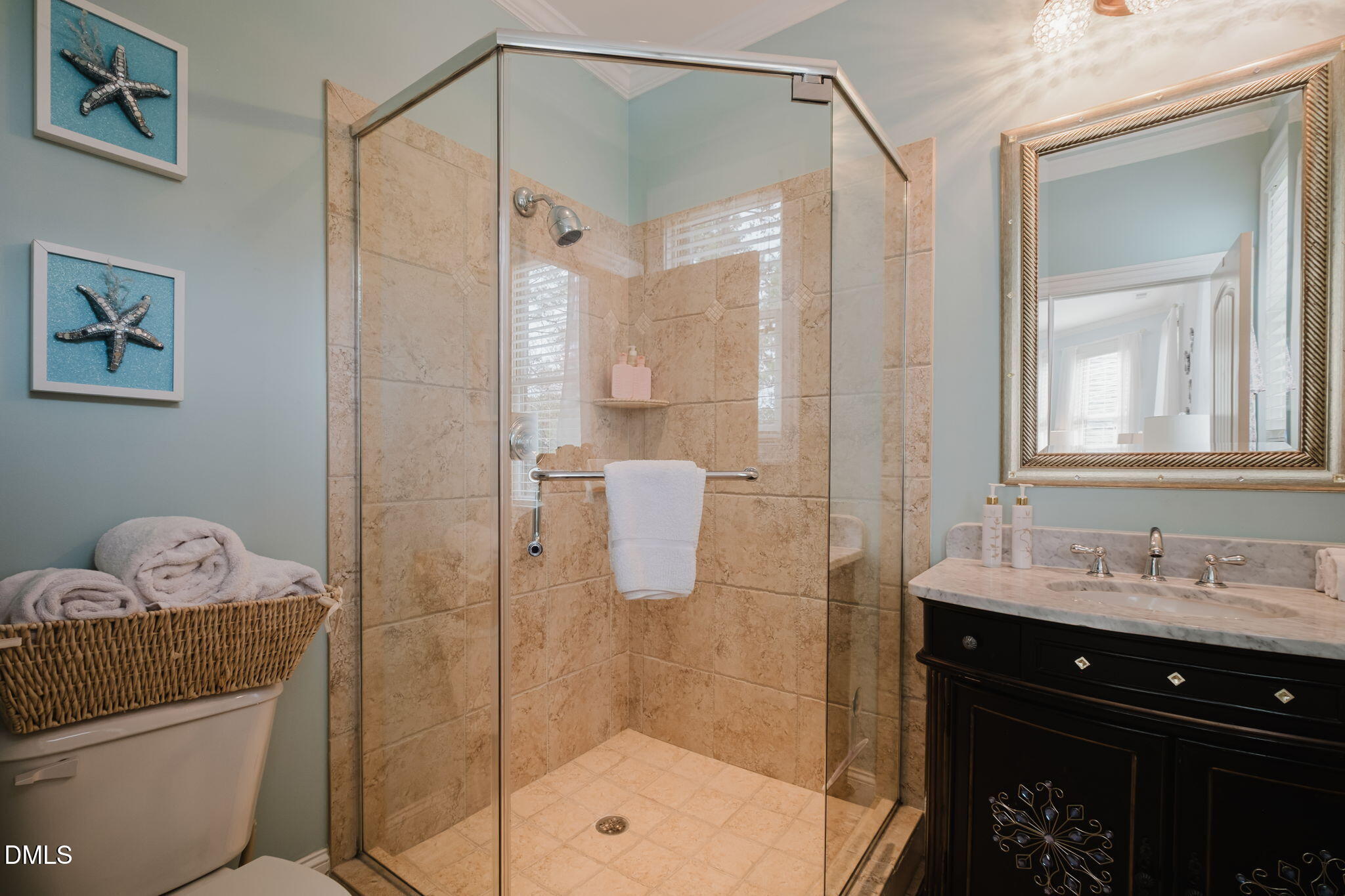 3604 Nightfall Court Raleigh, NC 27607 - Photo 47 of 79 a bathroom with a shower sink and mirror