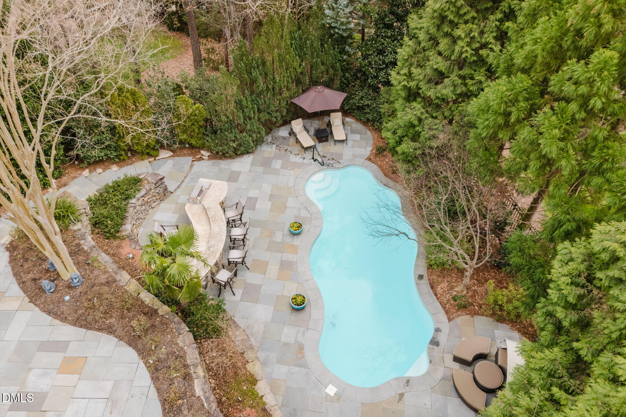 3604 Nightfall Court Raleigh, NC 27607 - Photo 61 of 79 a view of a swimming pool with sitting area