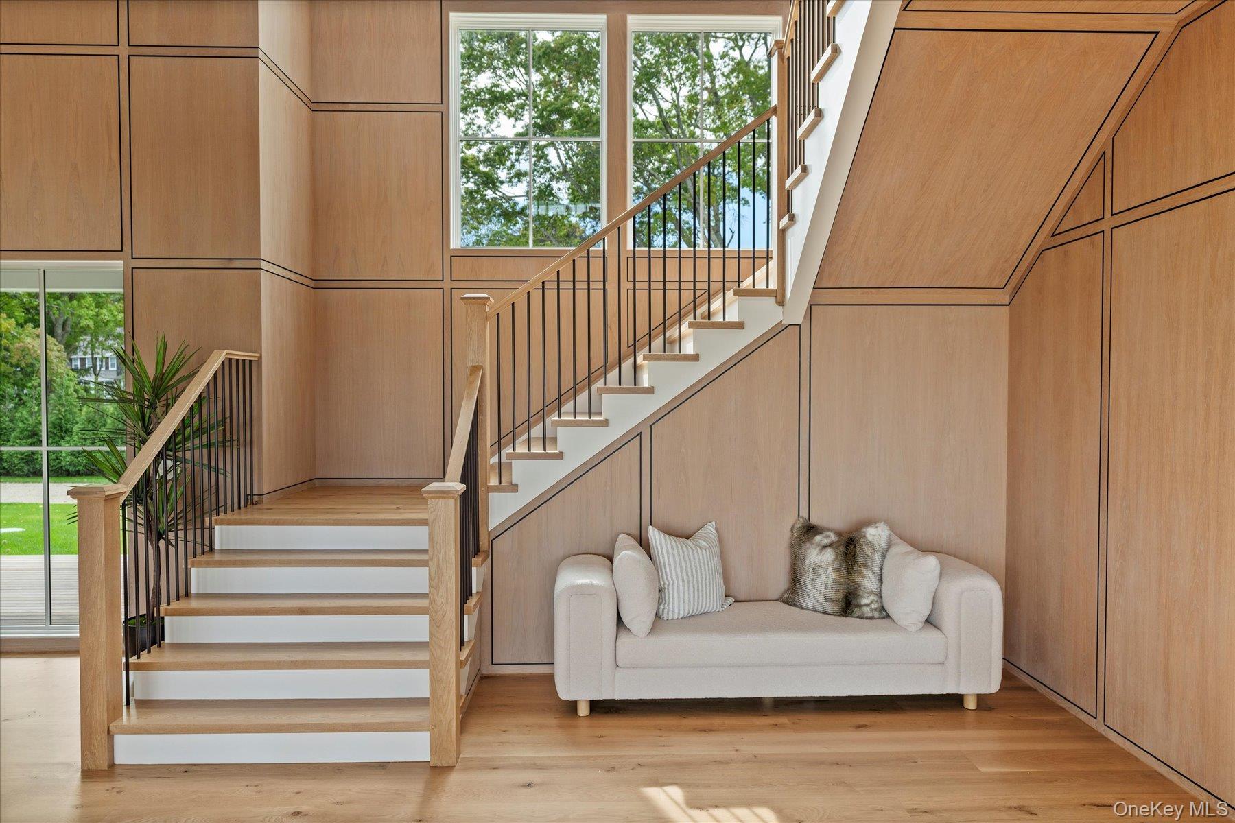 551 Main Street Quiogue, NY 11978 - Photo 19 of 50 Staircase featuring wood finished floors