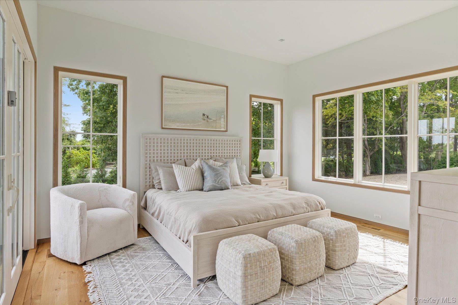 551 Main Street Quiogue, NY 11978 - Photo 23 of 50 Bedroom featuring wood finished floors and baseboards