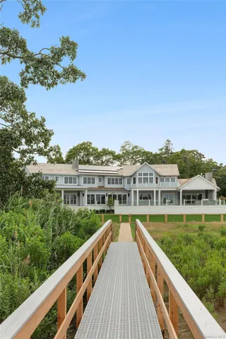 a view of a house with a ocean view