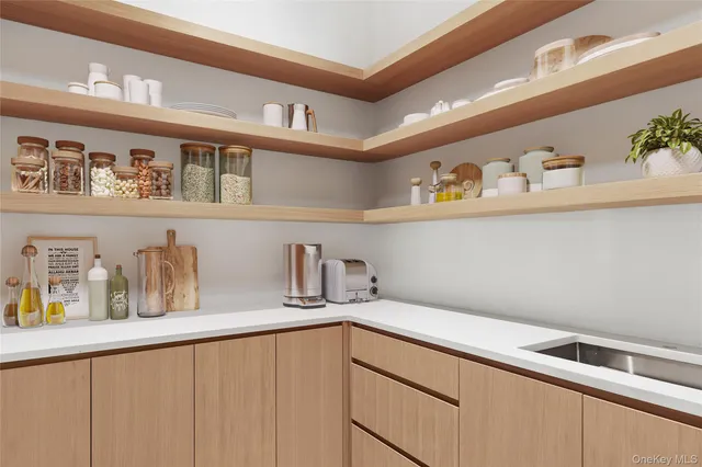 a kitchen with a sink and cabinets