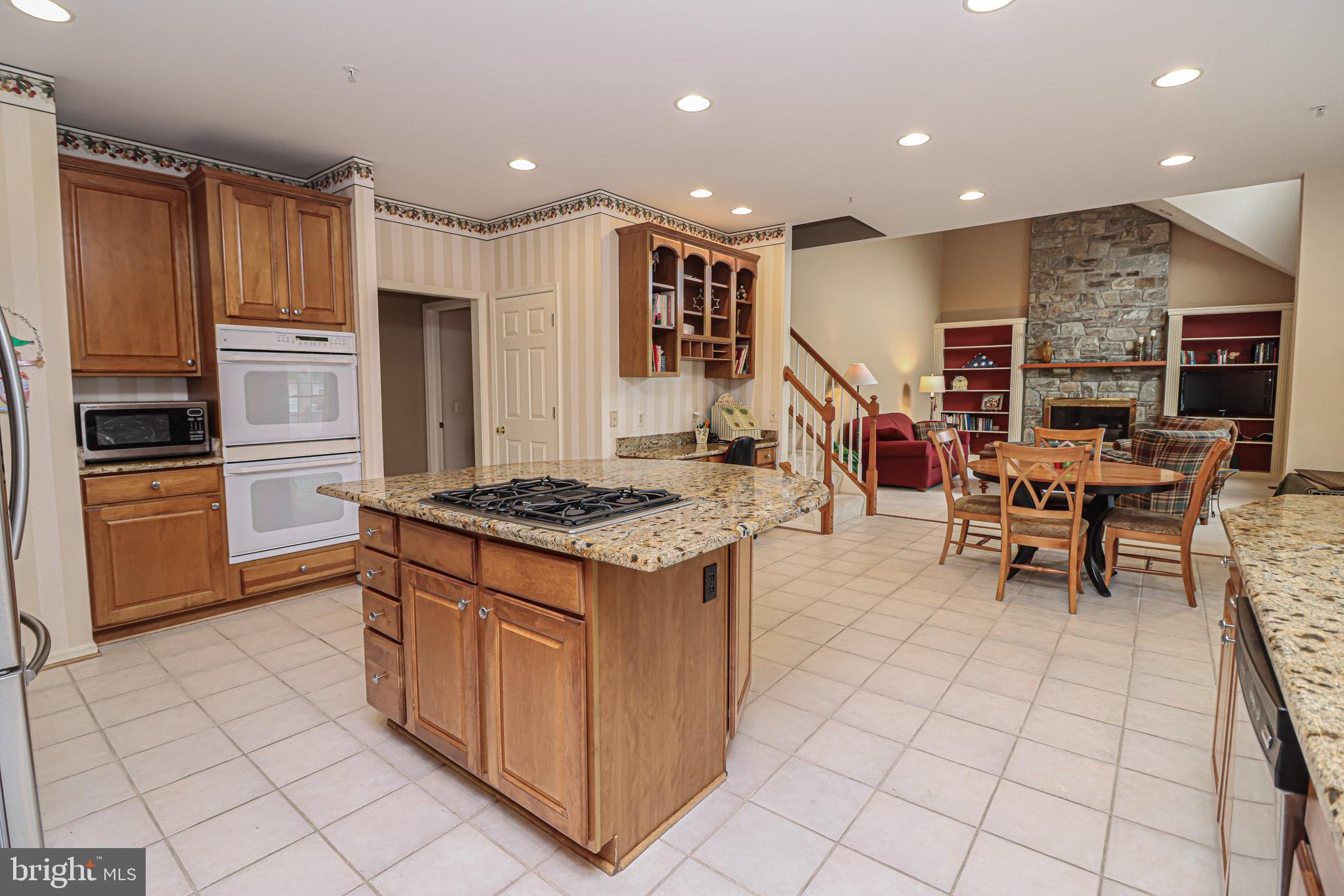 18308 Wickham Road Olney, MD 20832 - Photo 14 of 45 Entertain in grand kitchen, open to other spaces