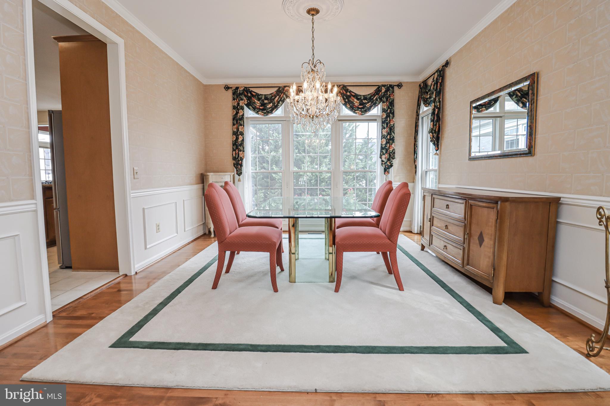 18308 Wickham Road Olney, MD 20832 - Photo 8 of 45 dining room with wainscotting and transom windows