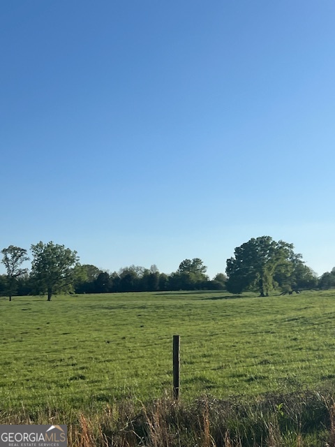 242 McCrary Road Molena, GA 30258 - Photo 2 of 3 a view of a lake with a yard