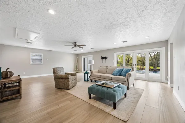 a living room with furniture and a table