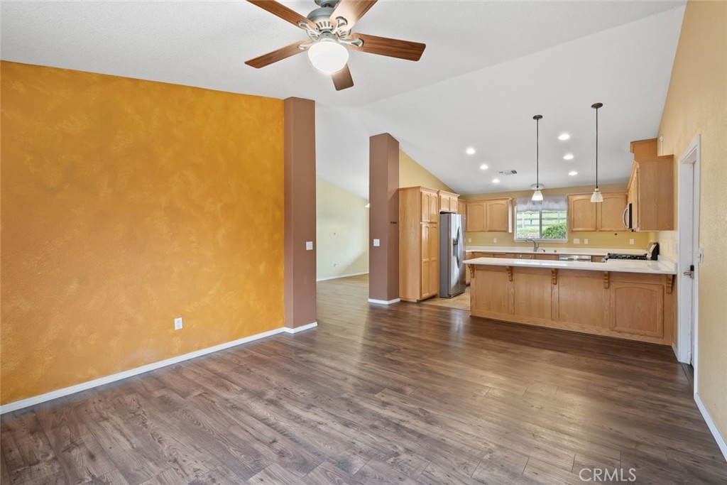 3735 Monterey Road Atascadero, CA 93422 - Photo 12 of 33 a view of kitchen with stainless steel appliances granite countertop cabinets and a wooden floor