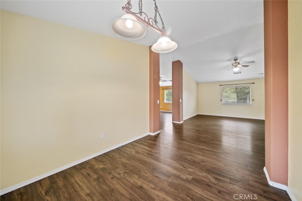 3735 Monterey Road Atascadero, CA 93422 - Photo 14 of 33 a view of an empty room with wooden floor and a window