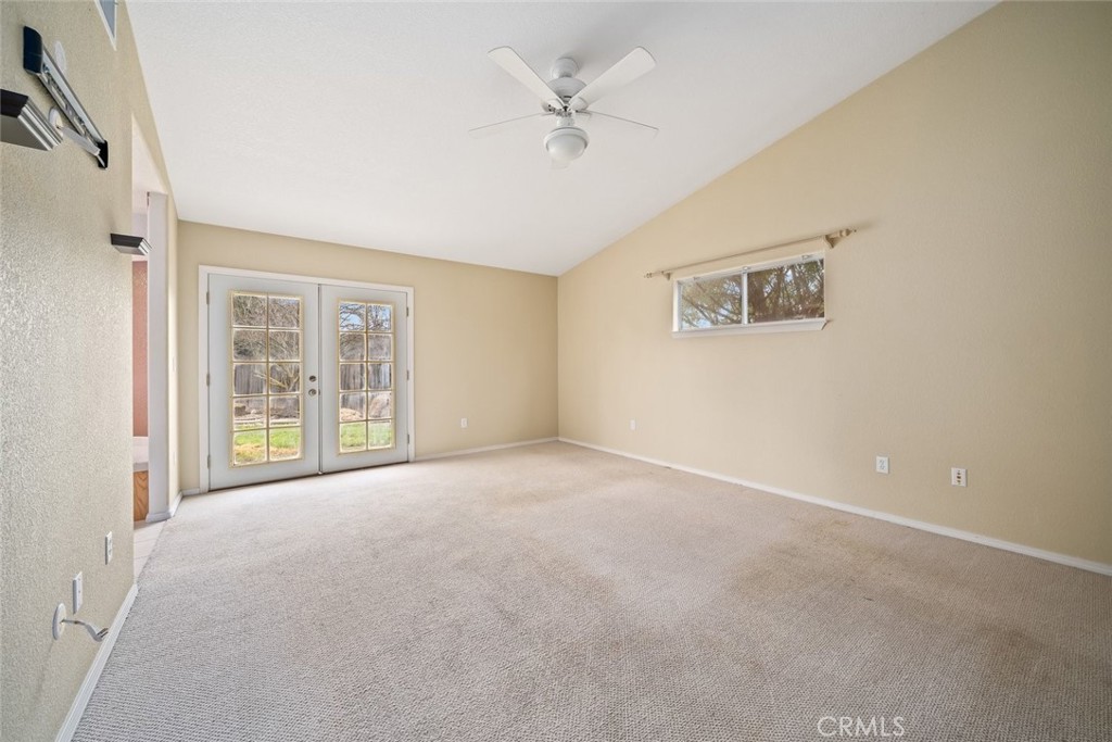 3735 Monterey Road Atascadero, CA 93422 - Photo 15 of 33 an empty room with windows and ceiling fan