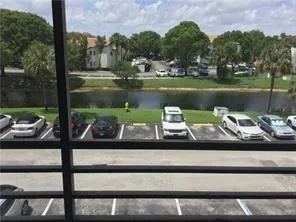 a view of a lake from a balcony