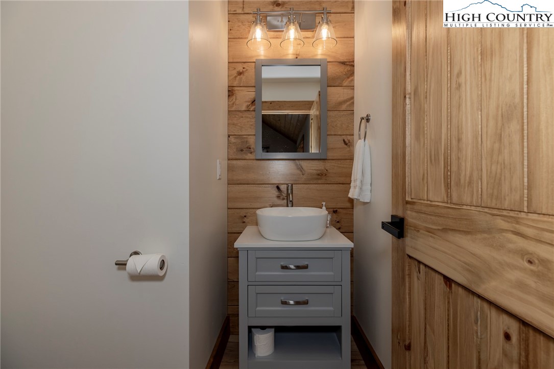 Lot 3 Old Hampton Road Boone, NC 28607 - Photo 22 of 32 a bathroom with a sink and mirror