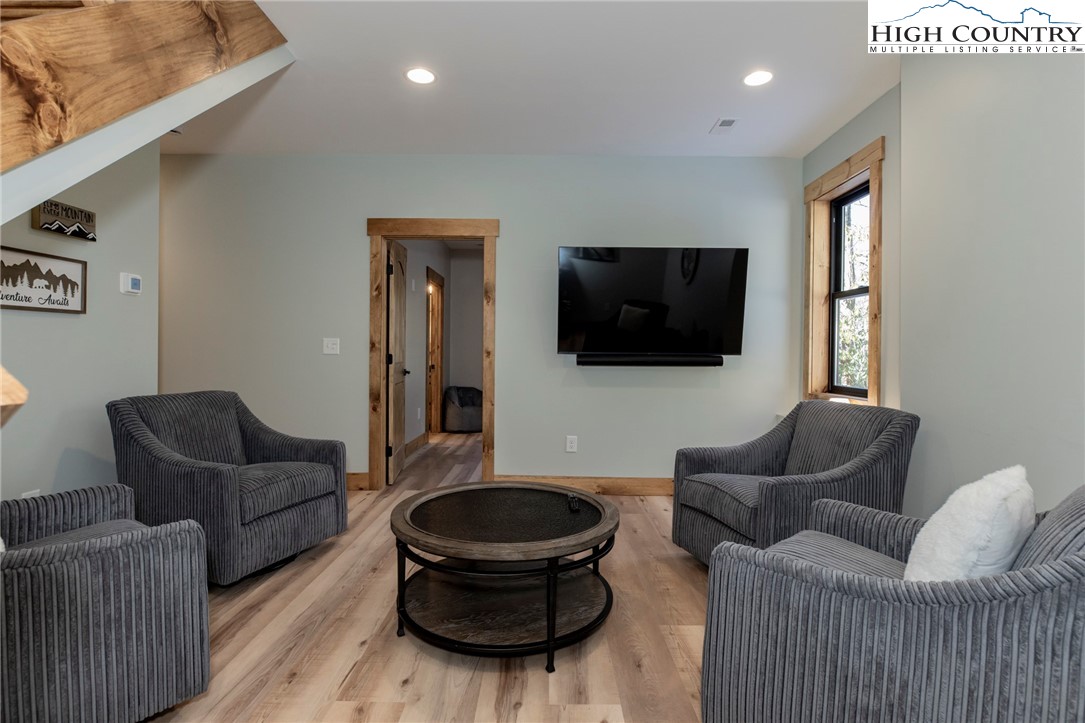 Lot 3 Old Hampton Road Boone, NC 28607 - Photo 24 of 32 a living room with furniture and a flat screen tv